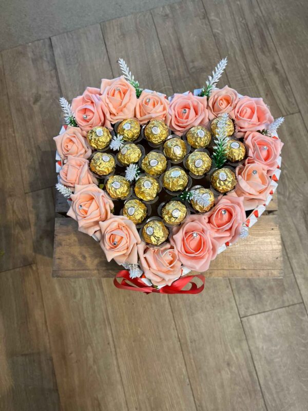 Heart shape artificial rose and chocolate box can be made with fresh flower