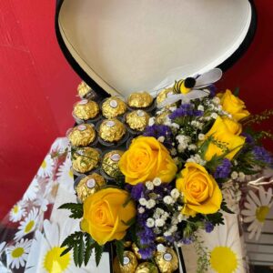 Heart shape hat fresh flowers and chocolate box